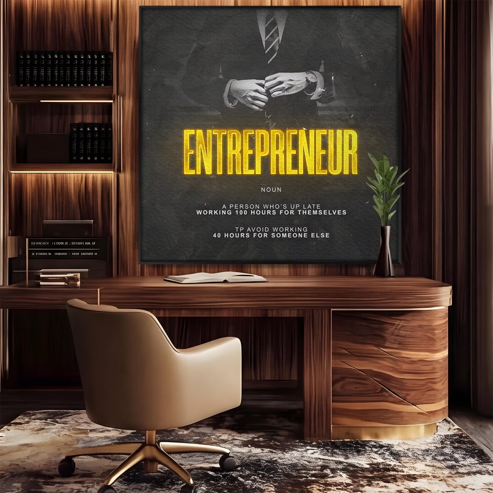 Tablou canvas cu ilustratie motivationala cu text si costum, in rama de aluminiu negru, pe perete intr-un birou